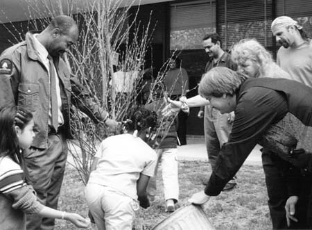 Planting a tree at Riverdale Elementary